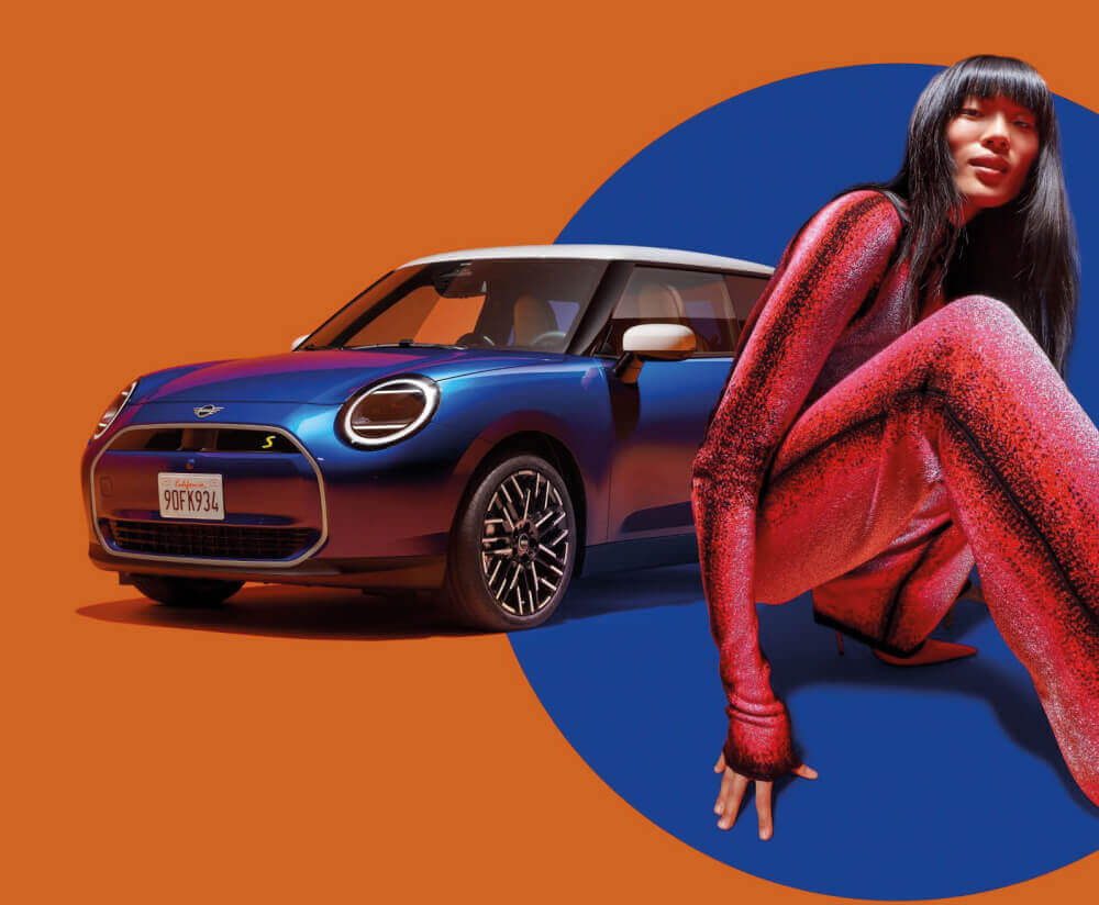 Front side angled view of blue MINI Cooper and model