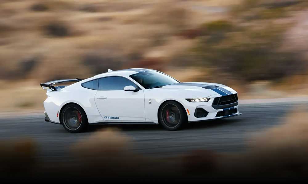 Shelby Mustang in white driving